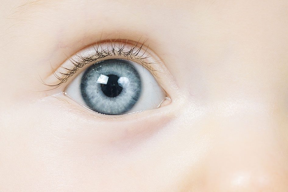 A closeup of a baby's blue eye. Lots of details.