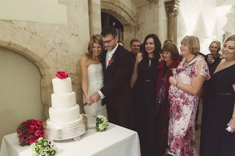 Wedding-Photographer-Farnham-Castle-Surrey-Cake-Cutting