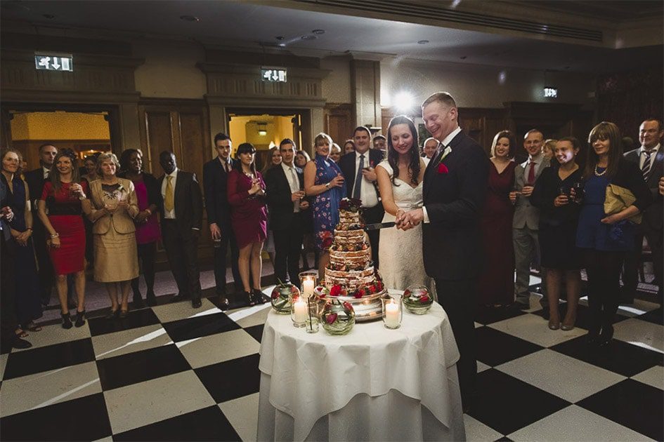 Cut the wedding cake at South Lodge Hotel in Sussex