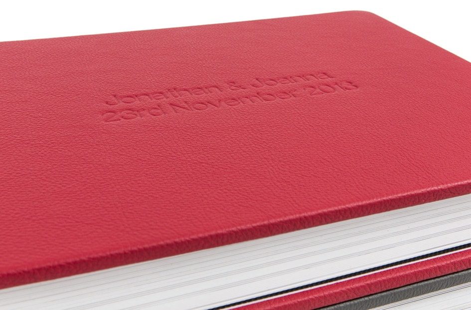 Red Graphistudio photobook with debossing.