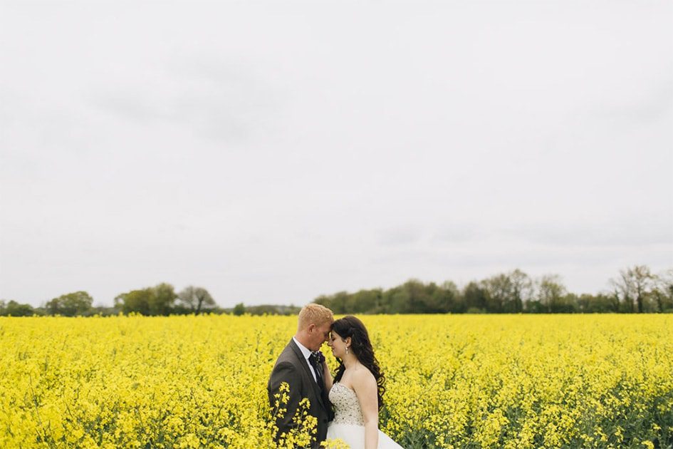 Wedding Photography in a rapeseed field.