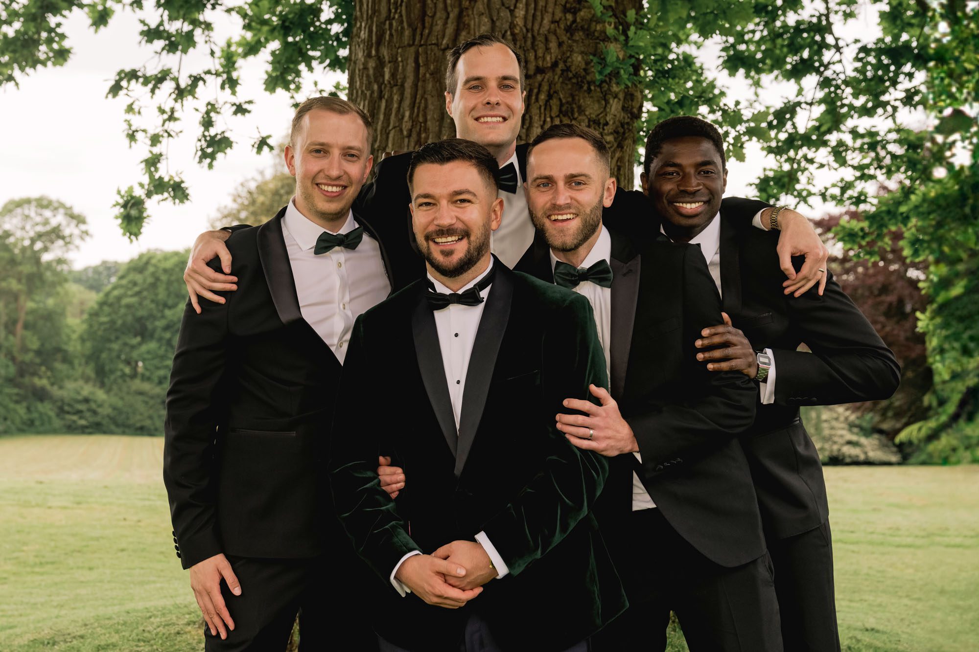 Group picture of the groom and his groomsmen at a wedding in Betchworth.