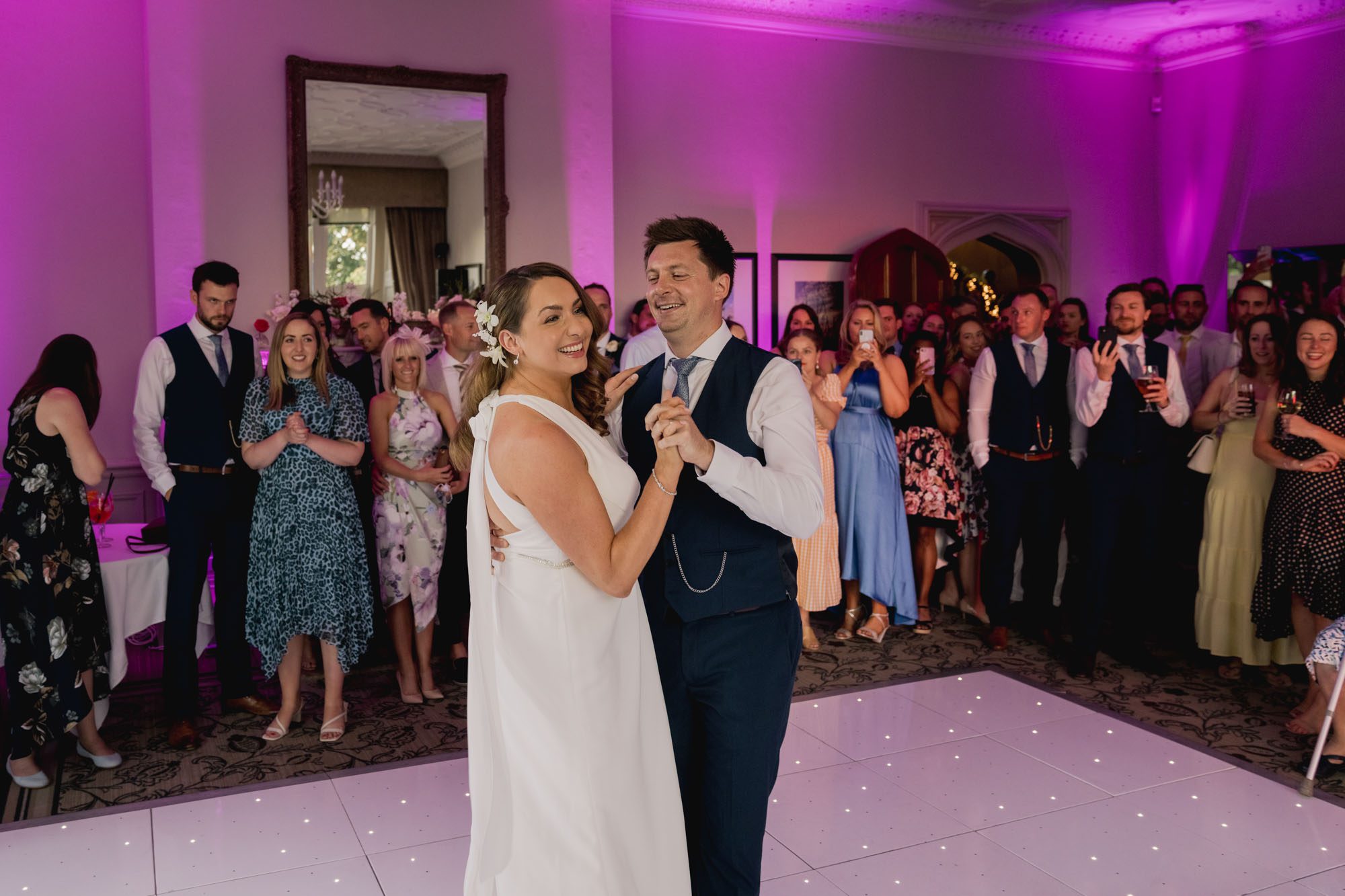 Bride and groom have their first dance together on their wedding day at Hartsfield Manor.