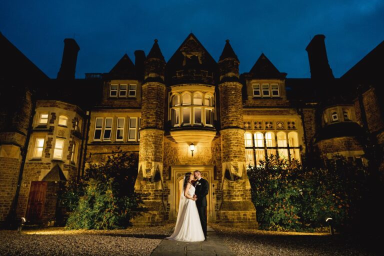 Bride and groom stare lovingly in to each other's eyes on their wedding day at Hartsfield Manor in Betchworth, Surrey.