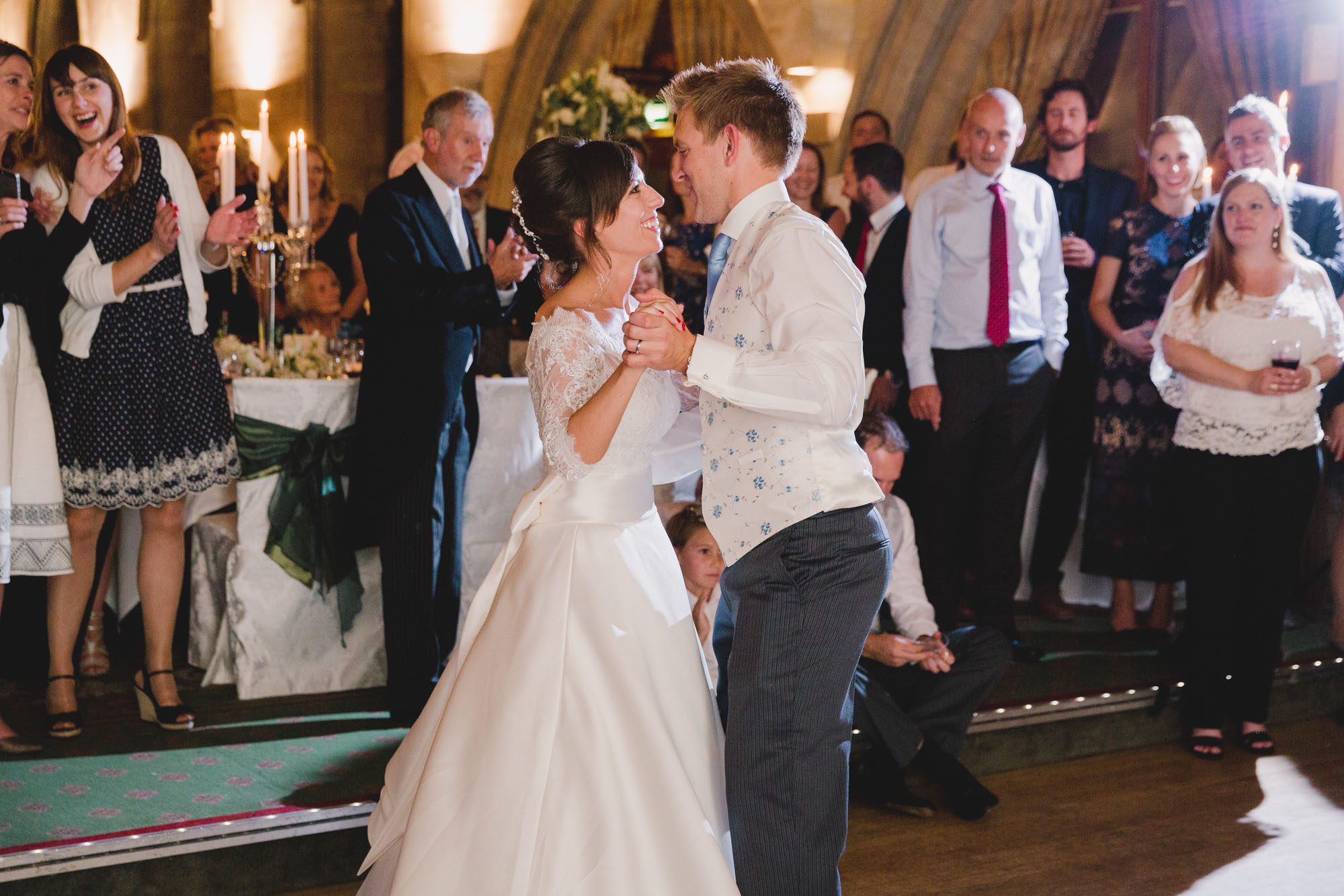 Bride and groom have their first dance together on their wedding day at Ashdown Park.