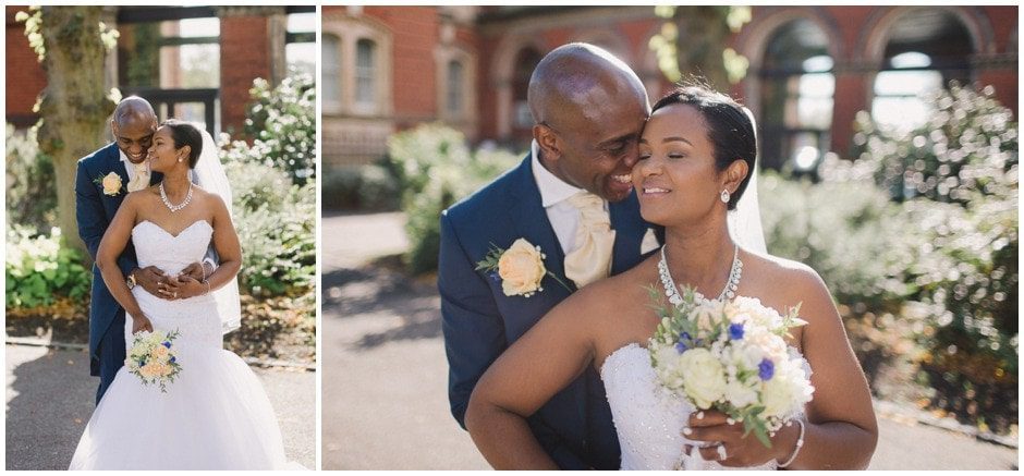 Newly wedded couple cuddle and kiss at Dulwich College