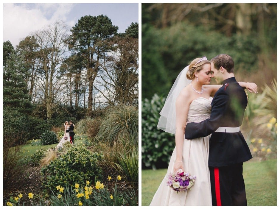 Wedding at Gorse Hill with bride and groom cuddling on a sunny day in Spring.