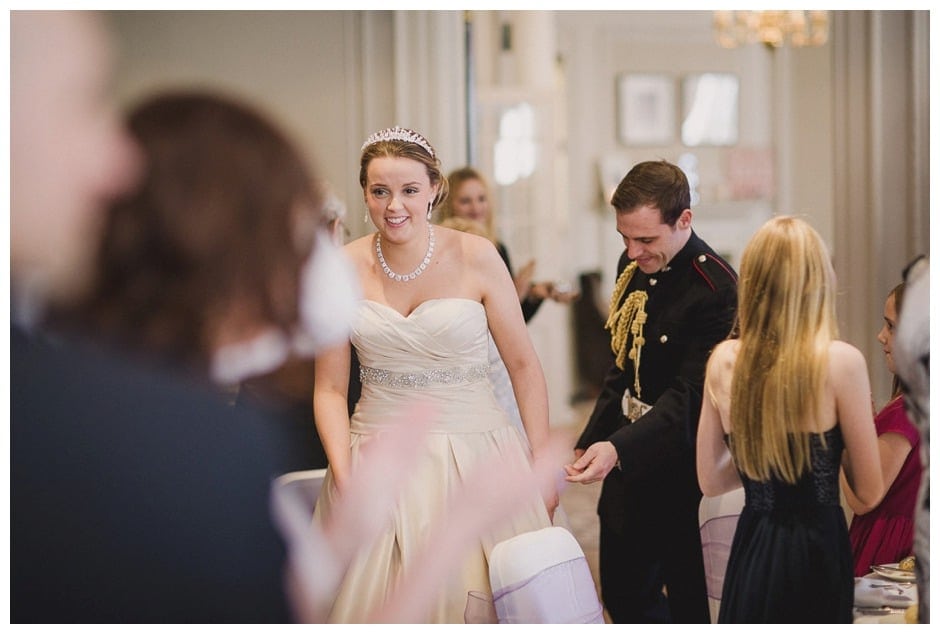Gorse ~Hill bride and groom walk in the room.