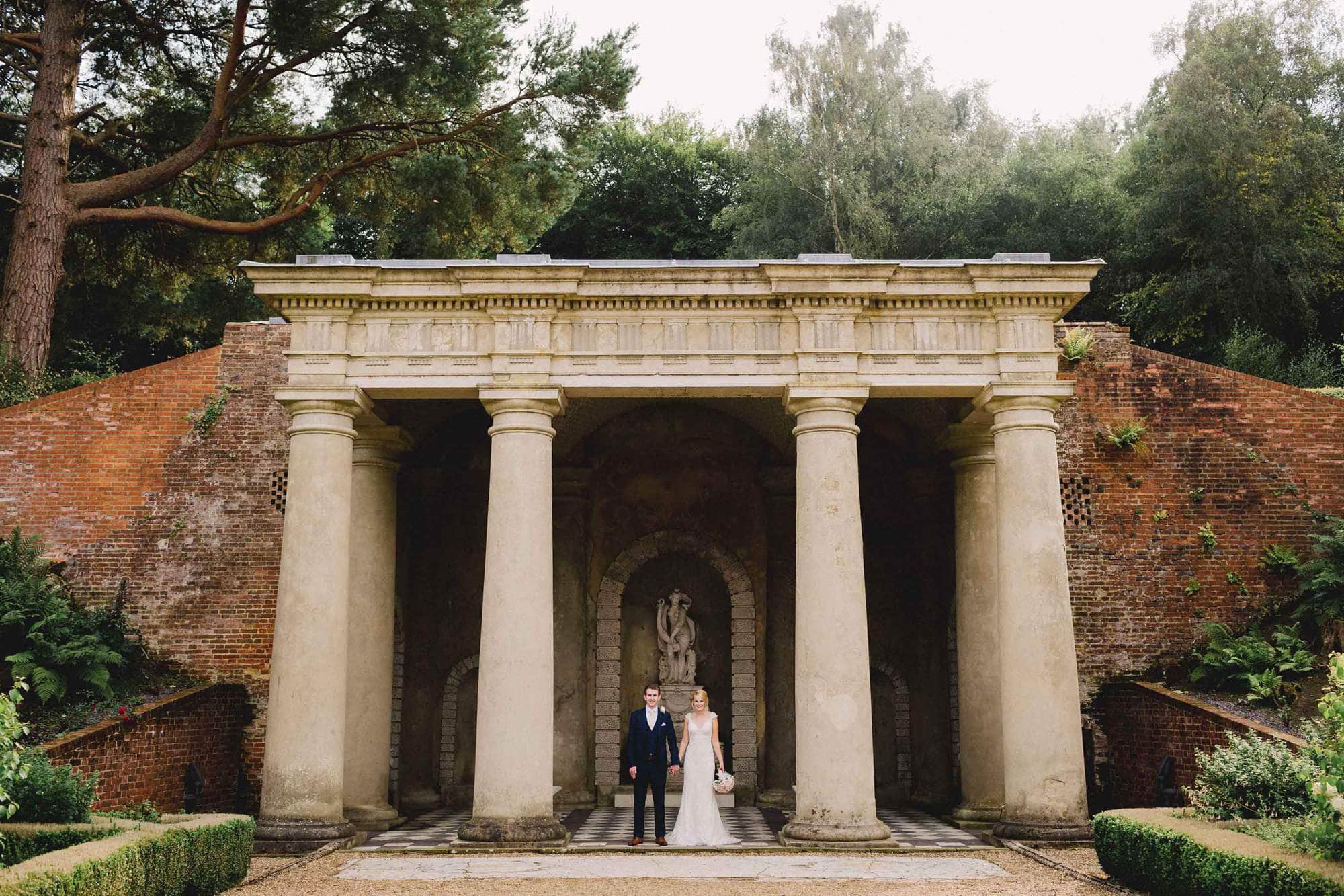 Wotton House temple with the bride and groom.
