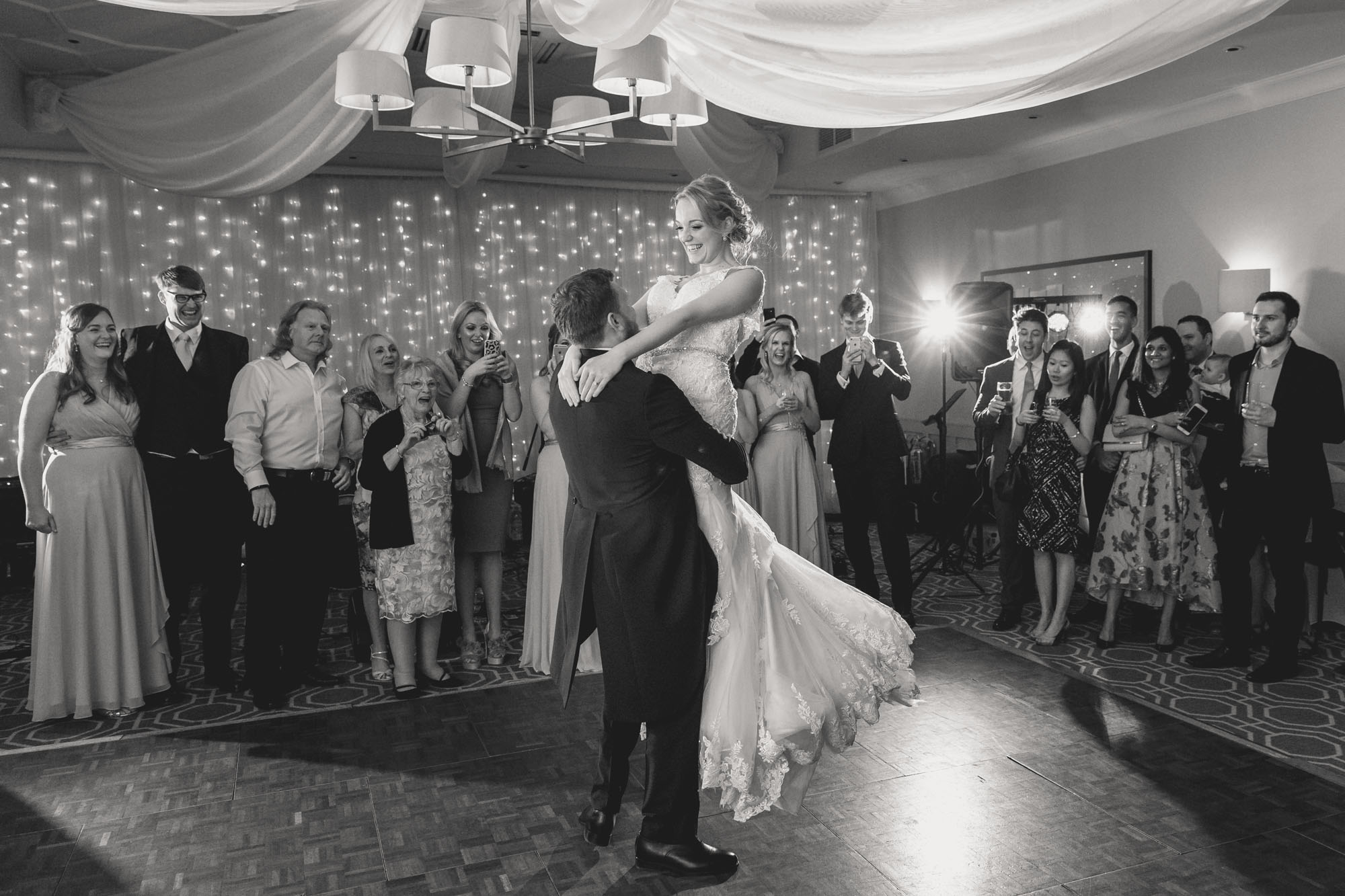 Bride and groom have their first dance together on their wedding day at Wotton House.