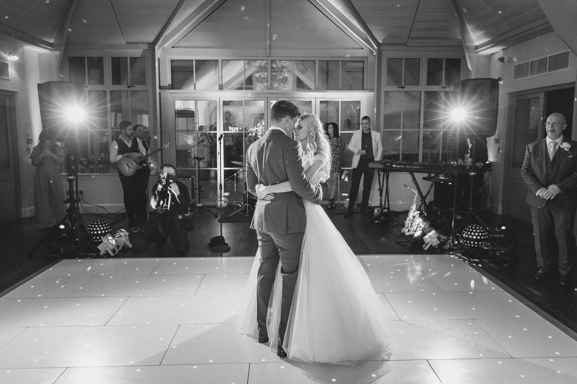 Bride and groom have their first dance together on their wedding day at Botleys Mansion.