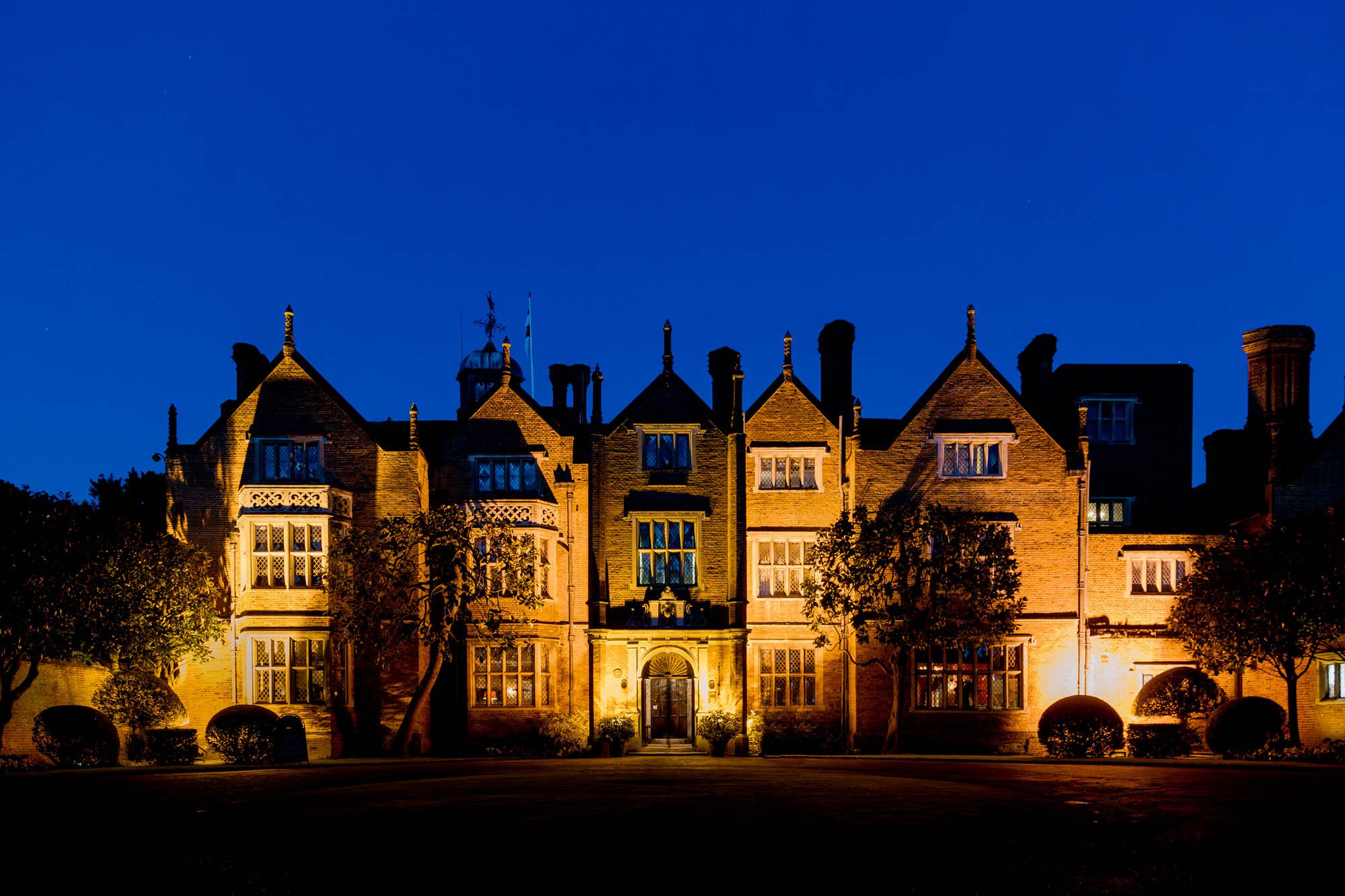 Great Fosters hotel in egham during the blue hour.