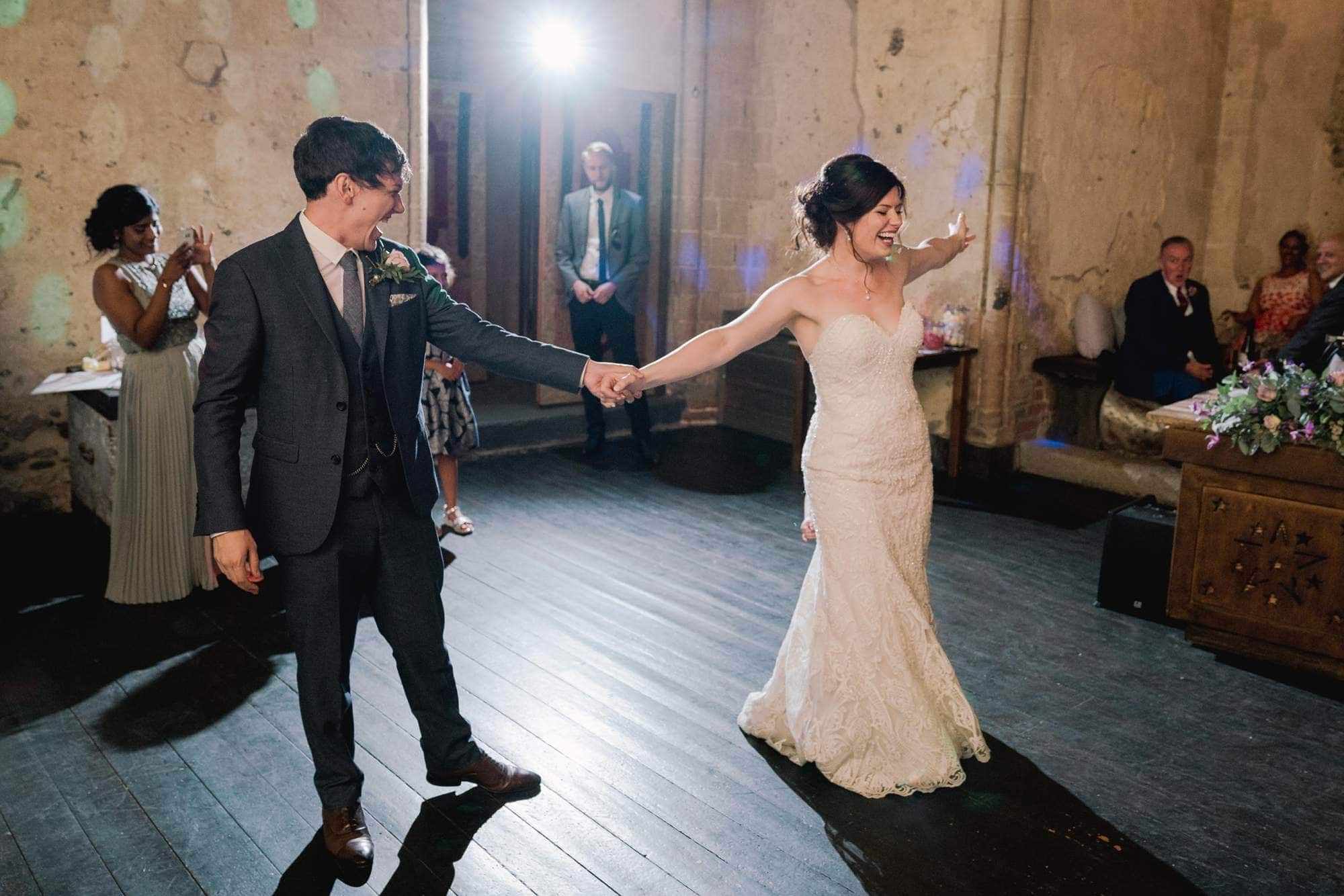 Bride and groom have their first dance together on their wedding day.