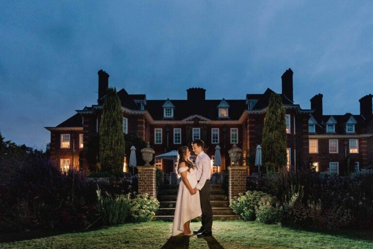 Bride and groom on their wedding day at Barnett Hill in Surrey