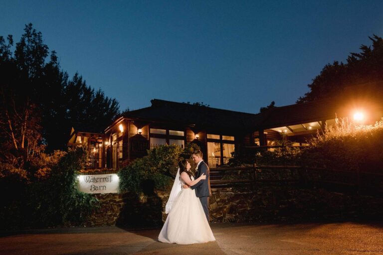 Bride and groom on their wedding day at Coltsford Mill in Surrey