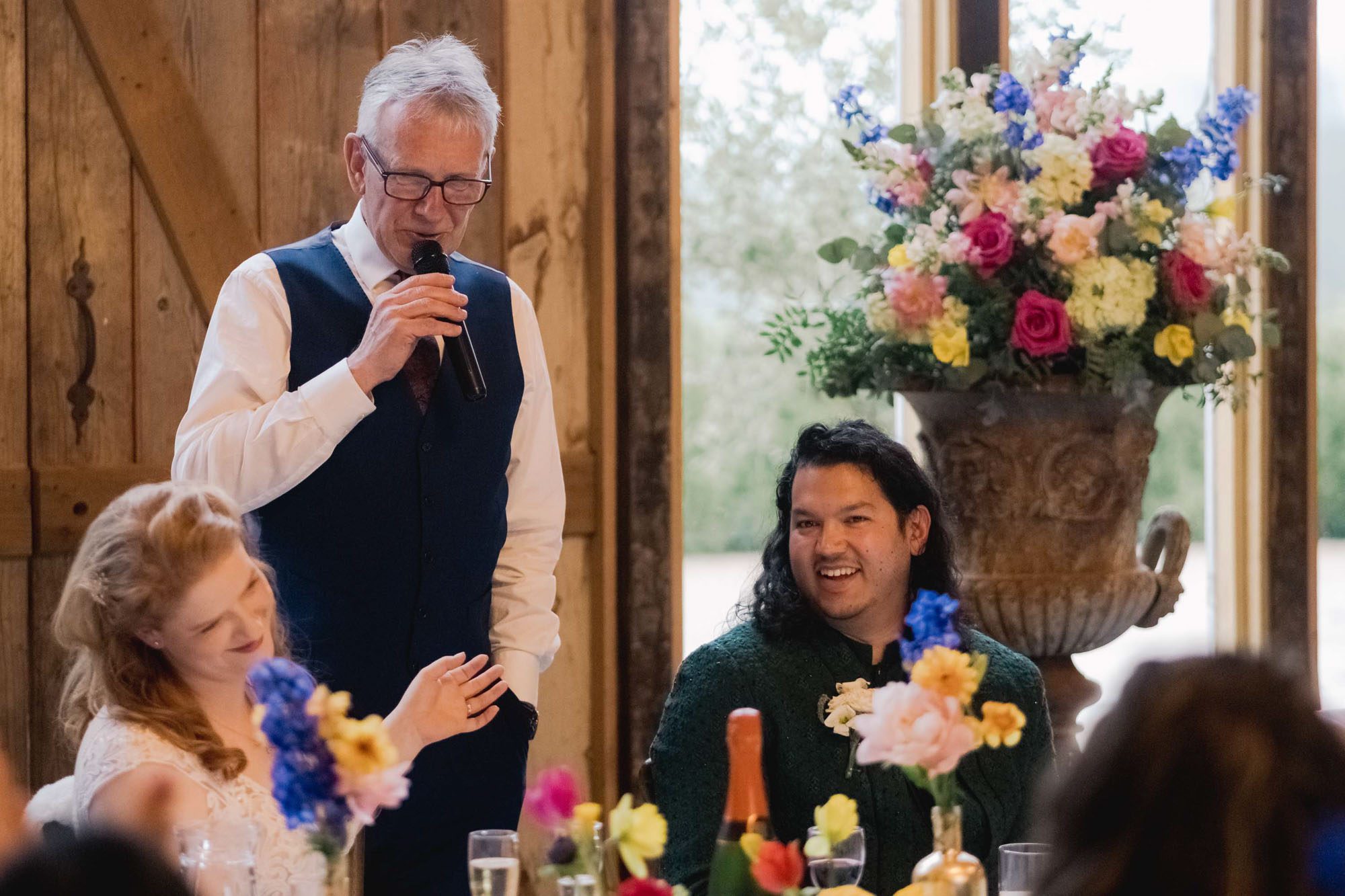Father of the bride delivers his speech at a wedding.