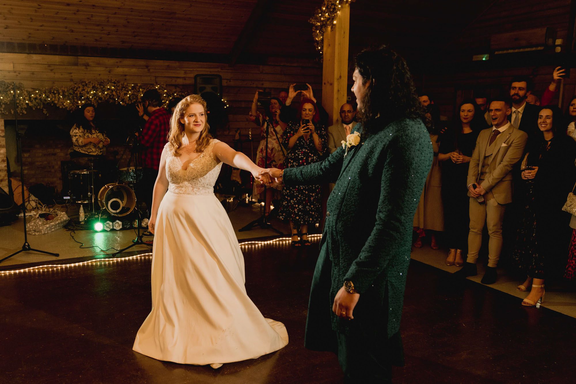 Bride and groom have their first dance together on their wedding day at High Billinghurst Farm.