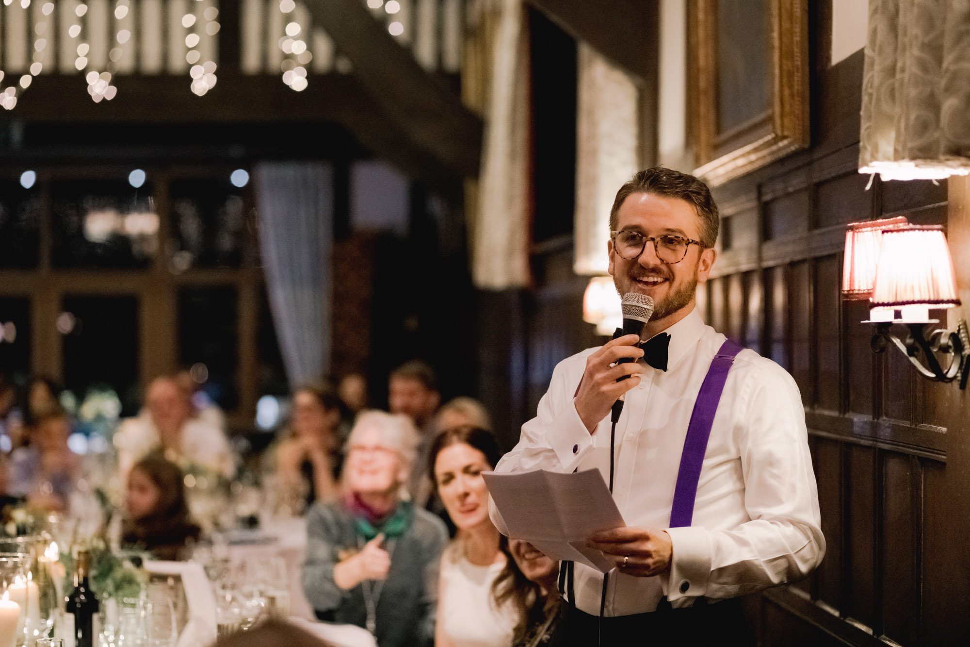 Groom delivers his speech at a wedding at Ramster Hall in Surrey.