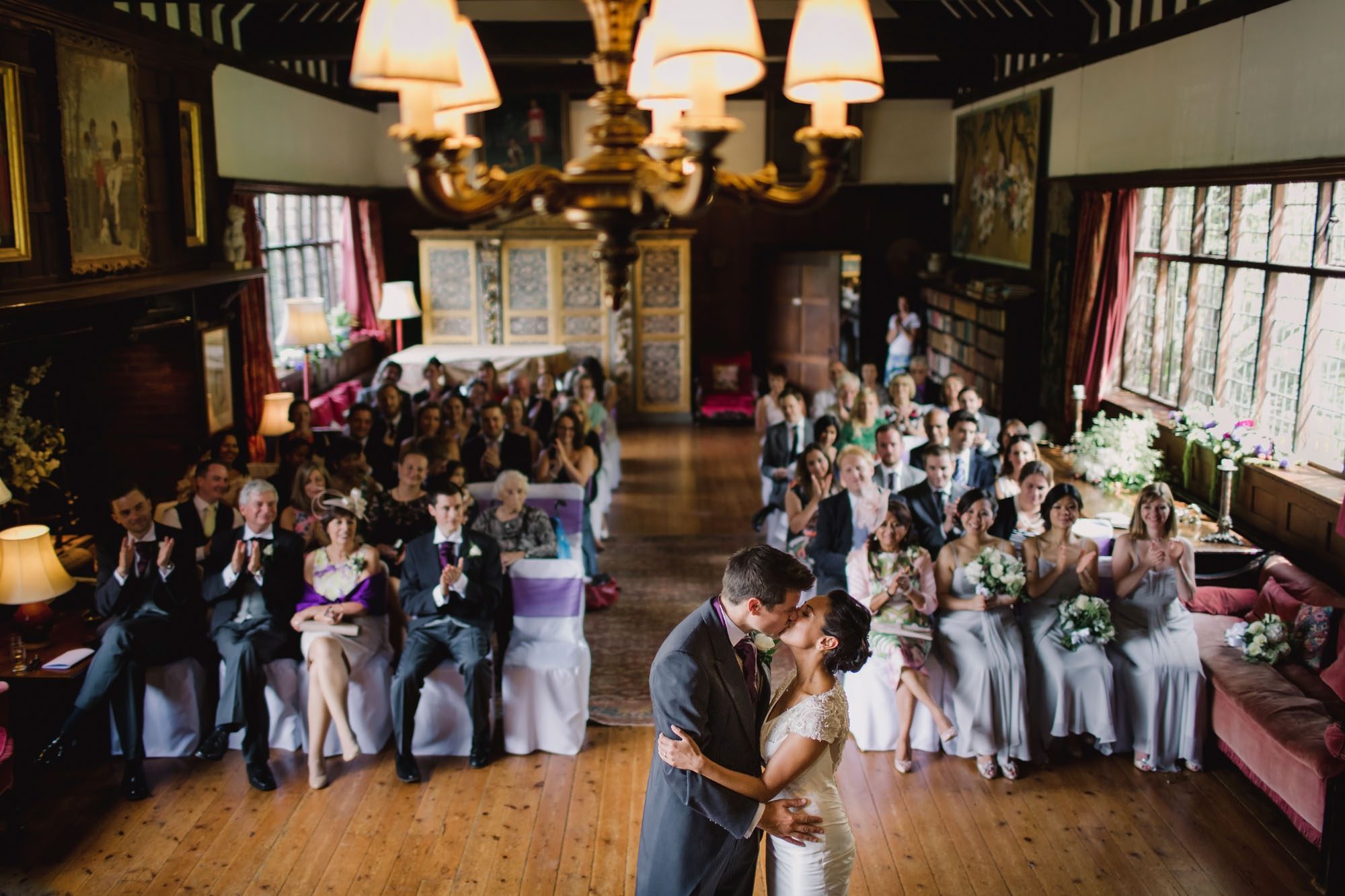 Bride and groom kiss on their wedding day in The Great Drawing Room.