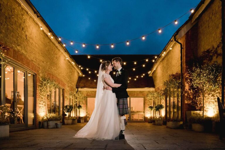 Twilight hour with a bride and groom at Millbridge Court in Surrey.