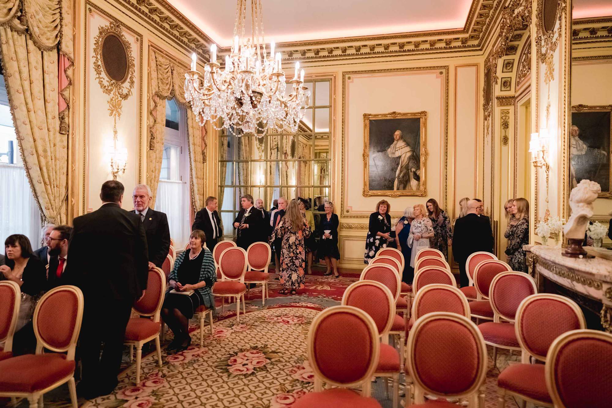 Guest gather for an intimate wedding ceremony at the Ritz in Mayfair.