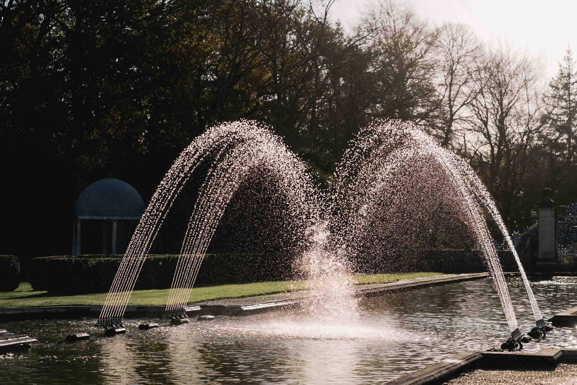 Water fountains at Rhinefield House wedding venue in Hampshire.