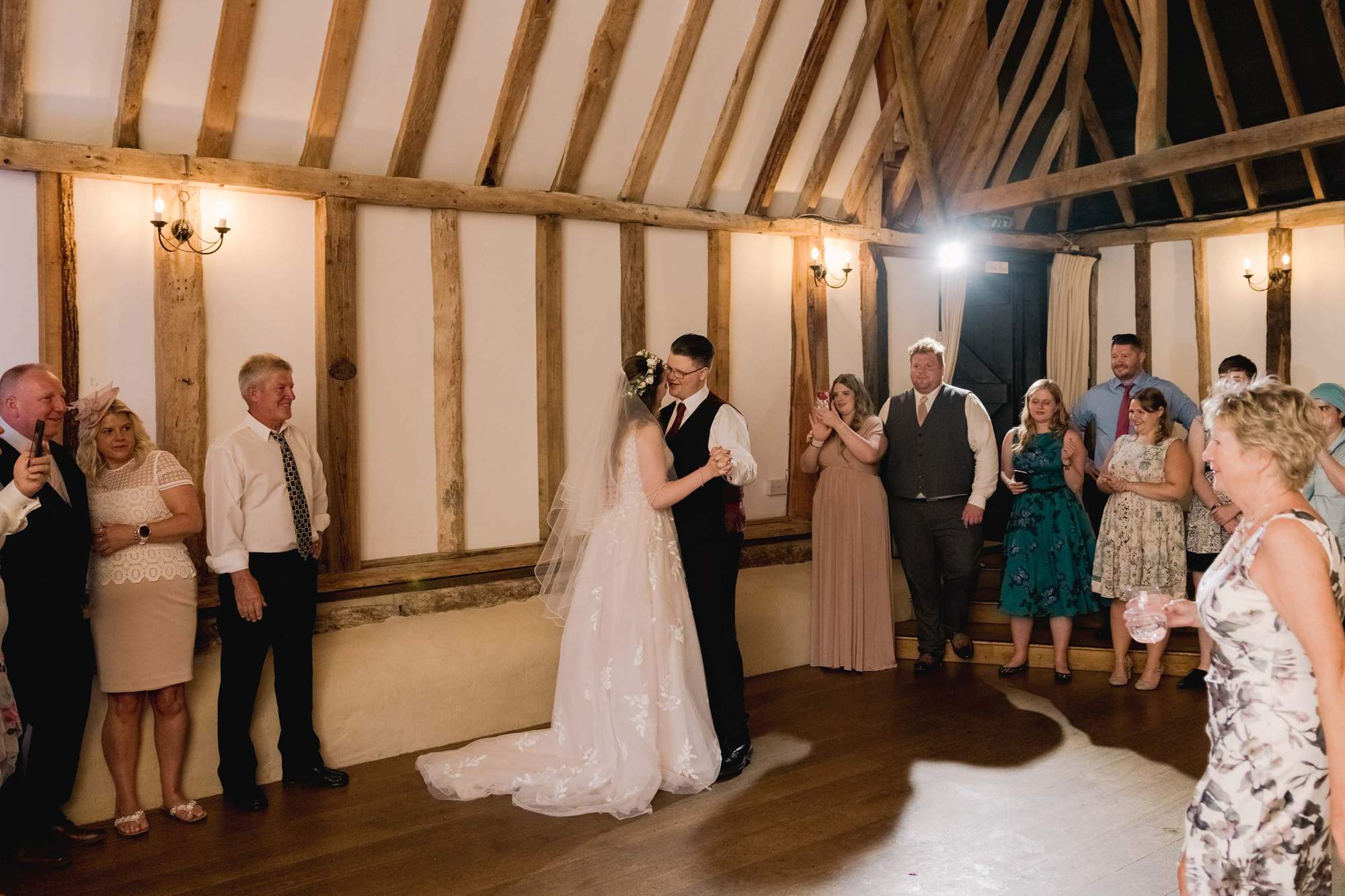 Newlyweds share their first dance at the Clock Barn.