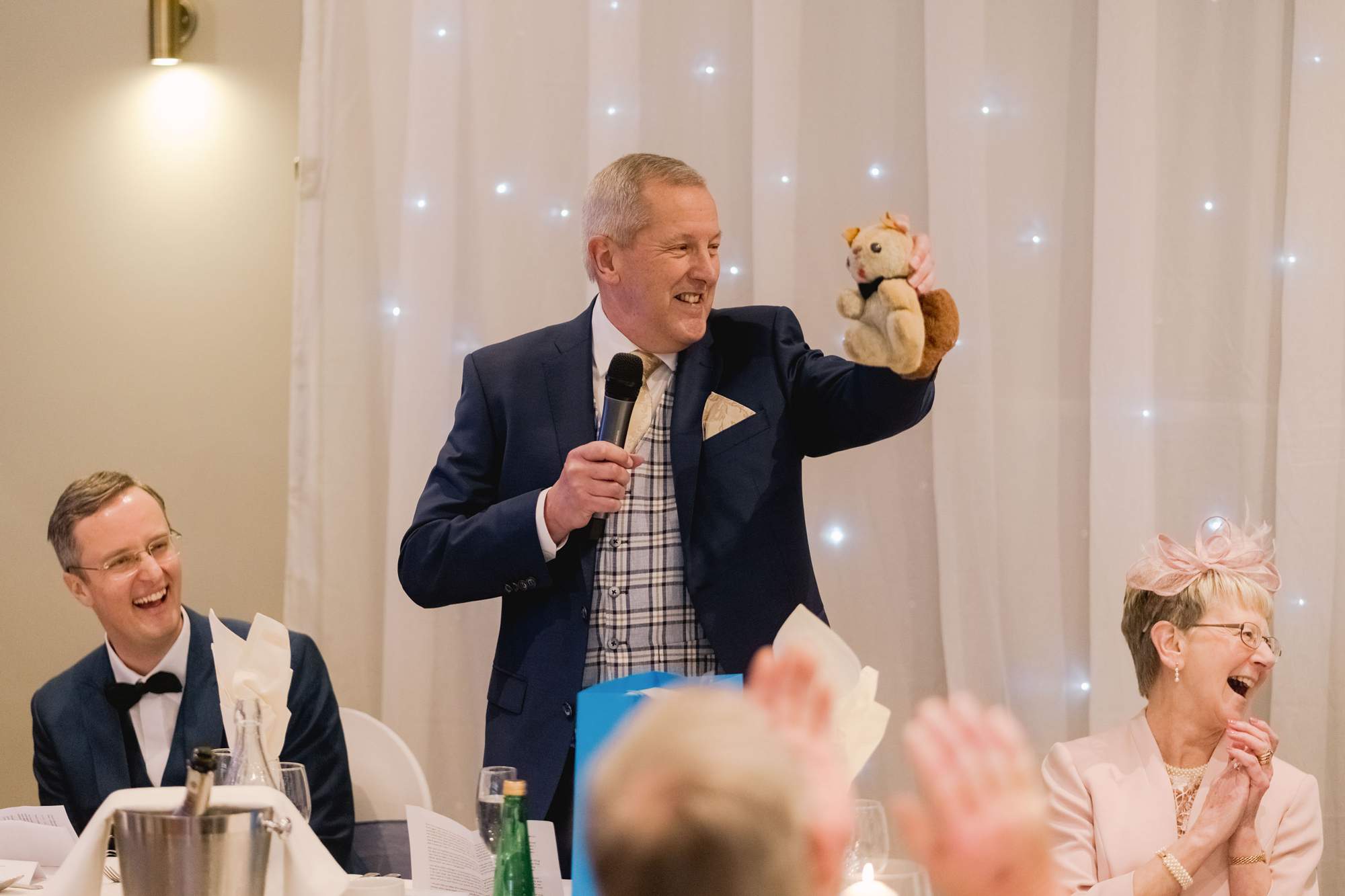 Father of the groom delivers his speech at a wedding at Wickwoods Country Club in East Sussex.