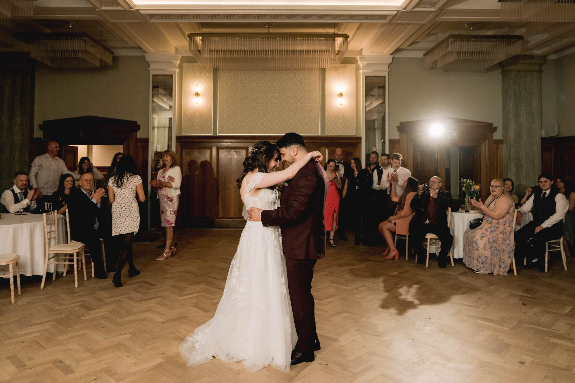 Bride and groom have their first dance together on their wedding day at Pelham House 