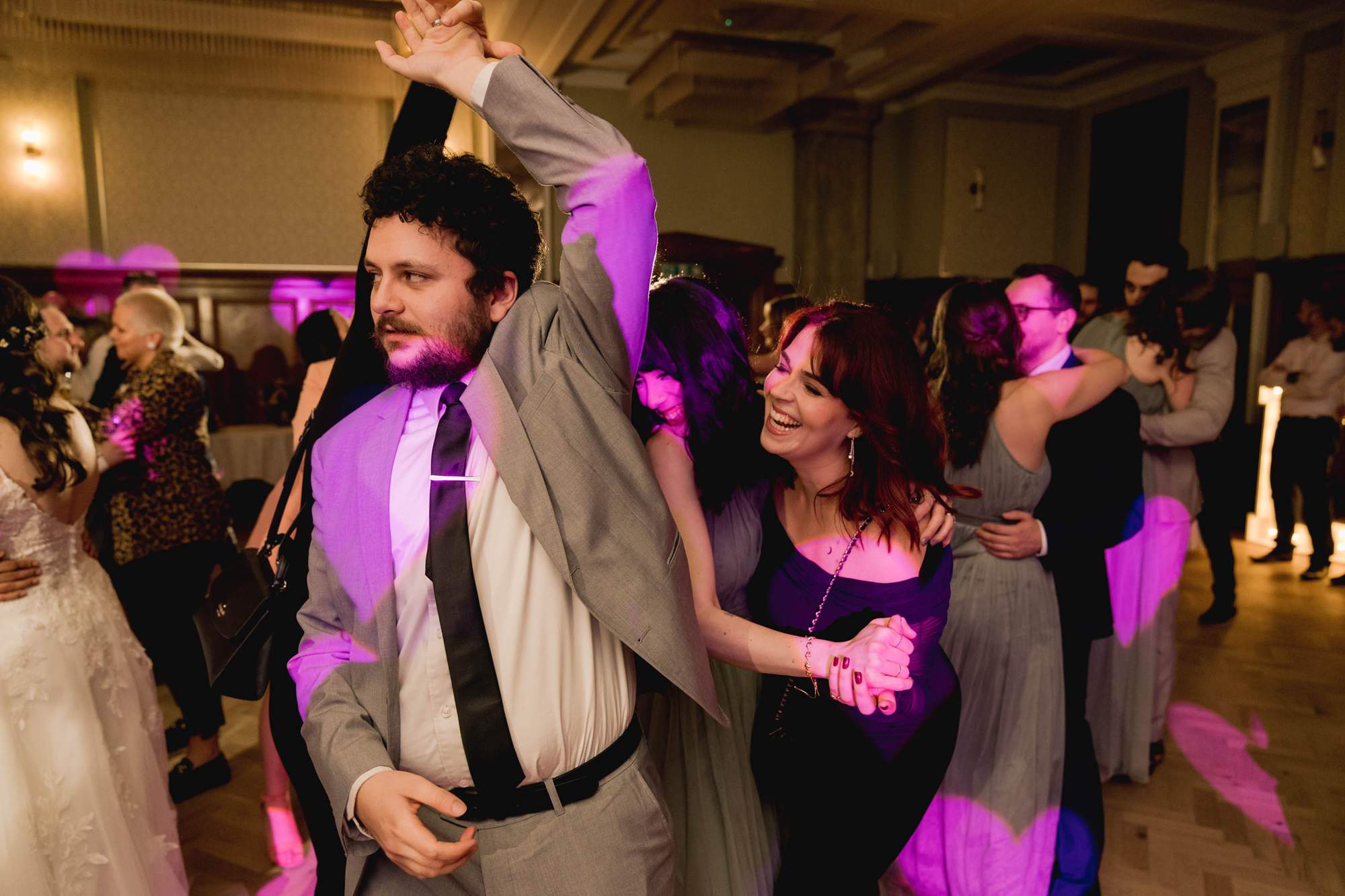 A guest dancing on the dance floor at a wedding at Pelham House.