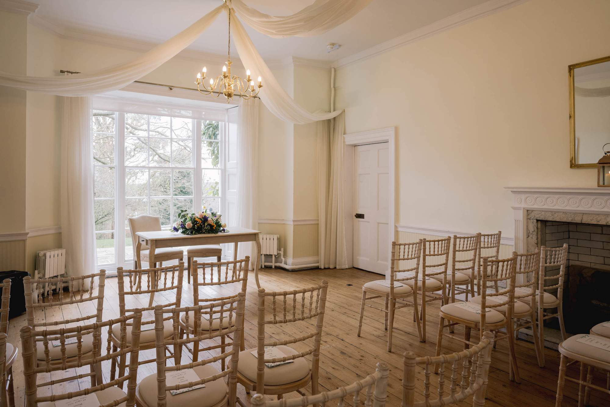 Wedding chairs ready for a ceremony at Pelham House in East Sussex.