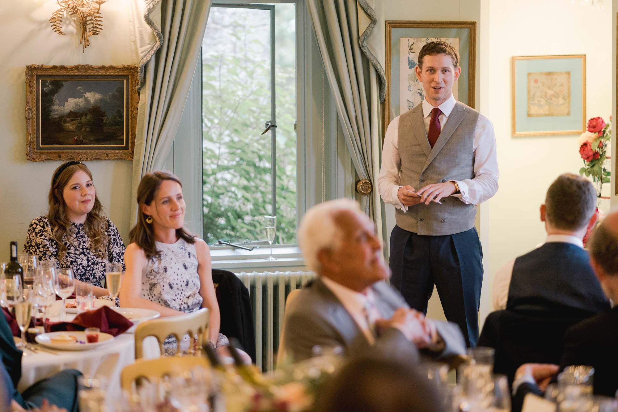 Groom delivers his speech at a wedding at Wadhurst Castle in Sussex.