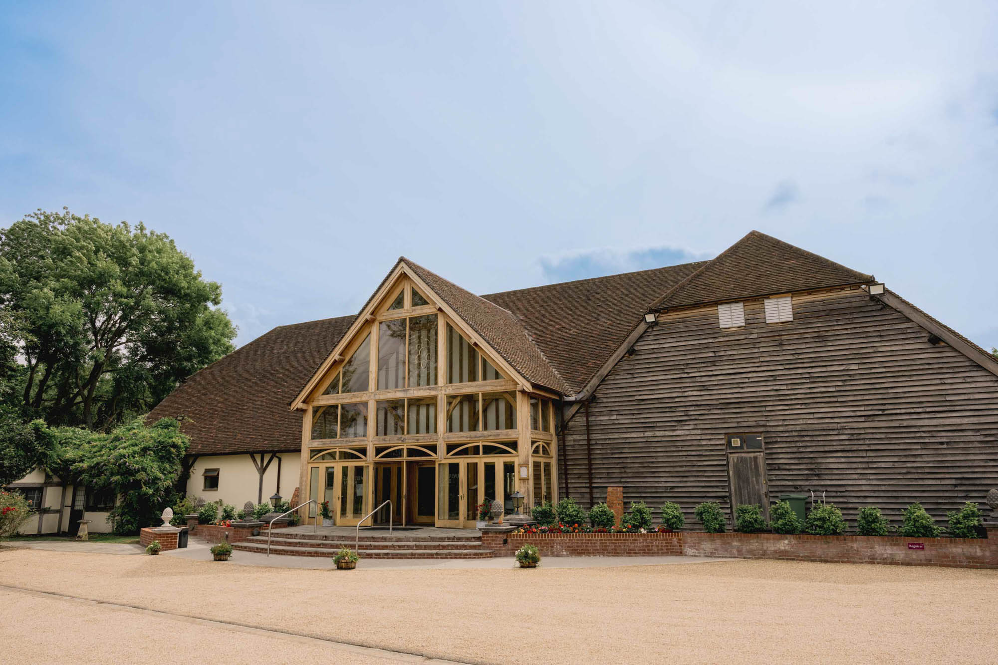 Rivervale Barn wedding venue in Hampshire on a sunny day.