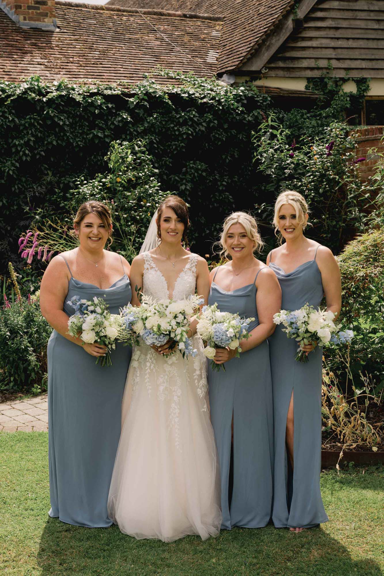 Bride and her 3 bridesmaids at Rivervale Barn in Hampshire.